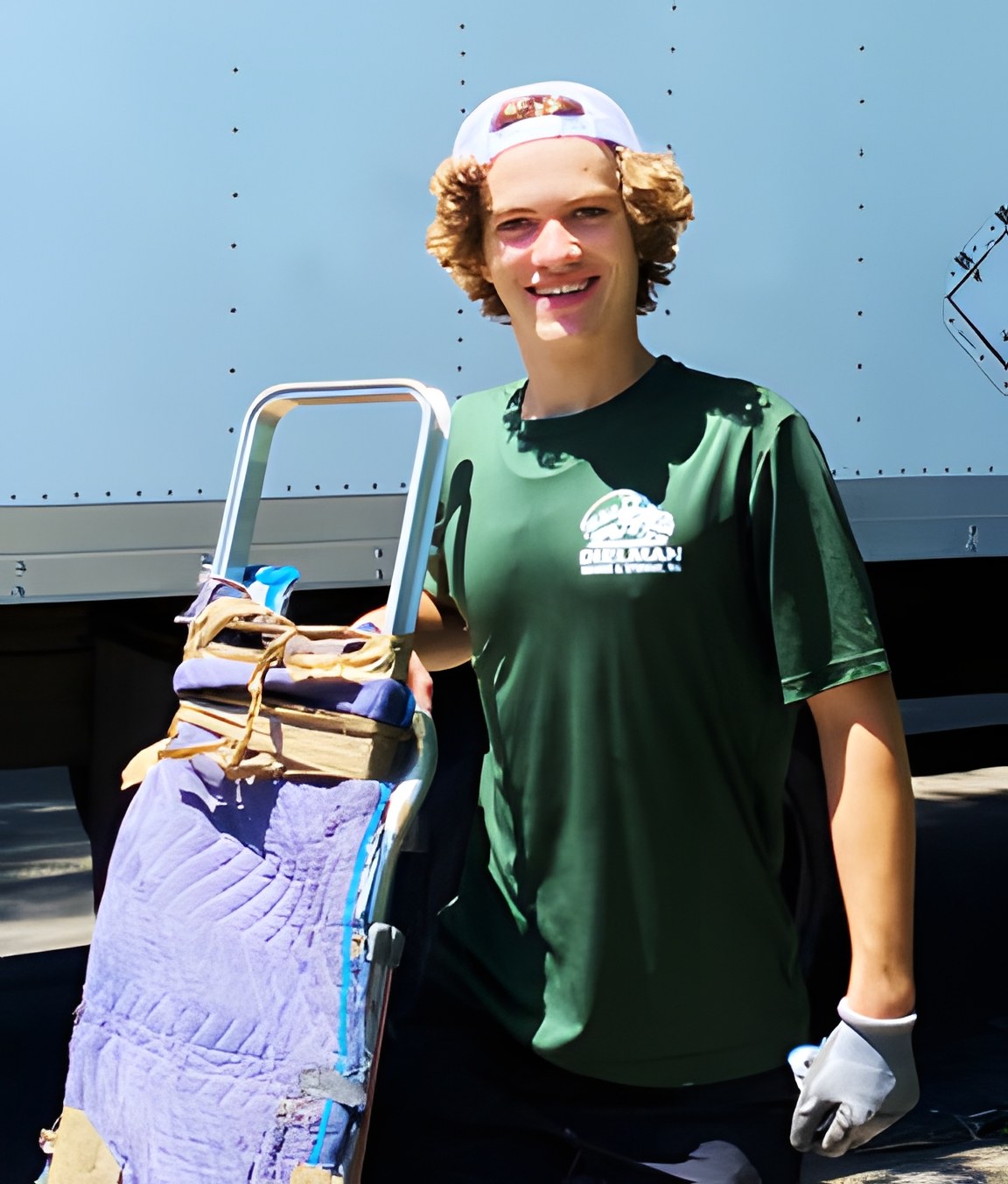 Dielman crew member with moving equipment